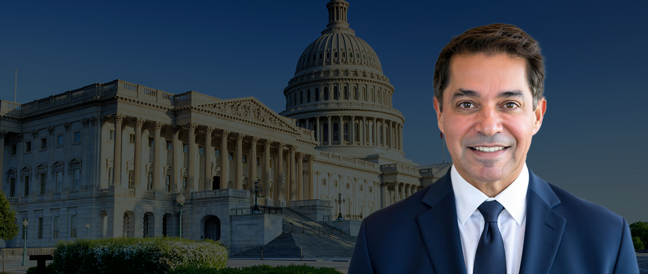Photo of Joseph Ostad in front of the United States Capitol